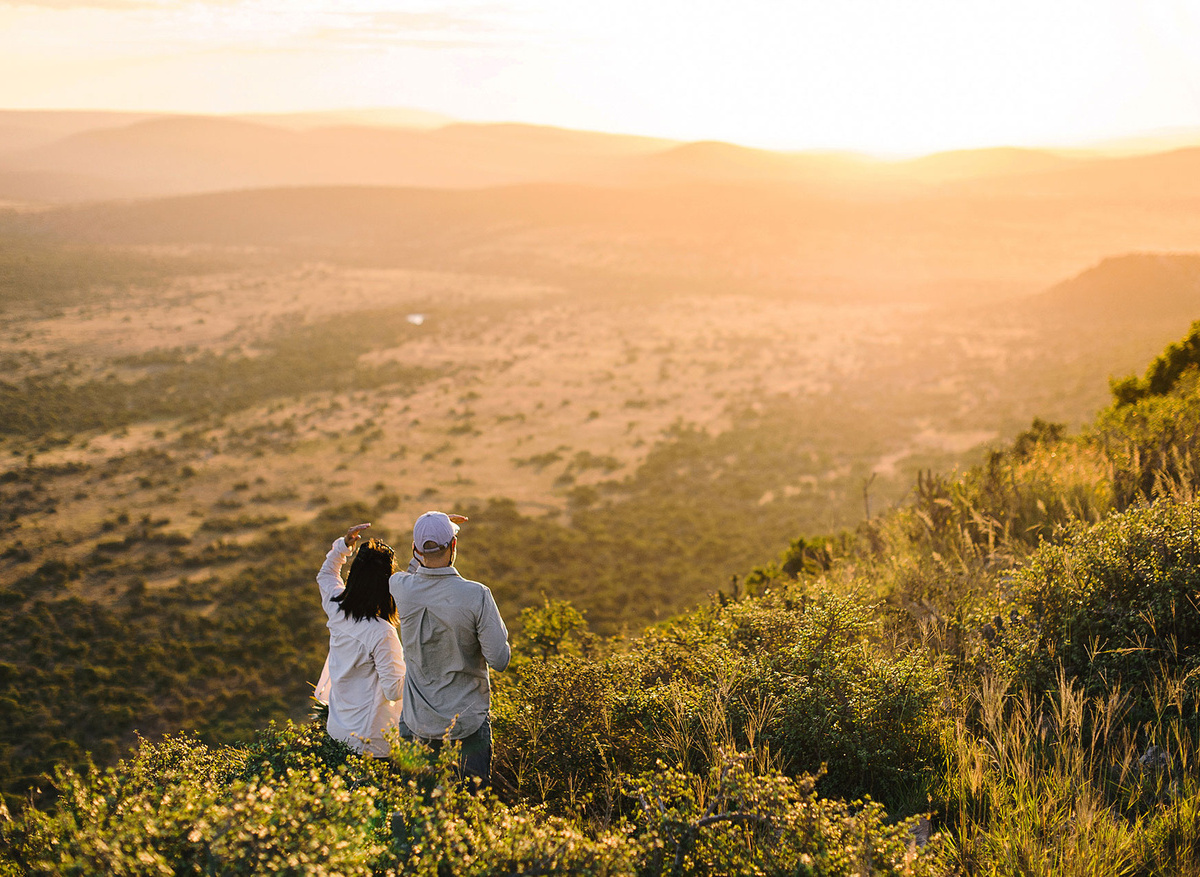 KWANDWE-PRIVATE-GAME-RESERVE---Guests-overlooking-the-landscape.jpg