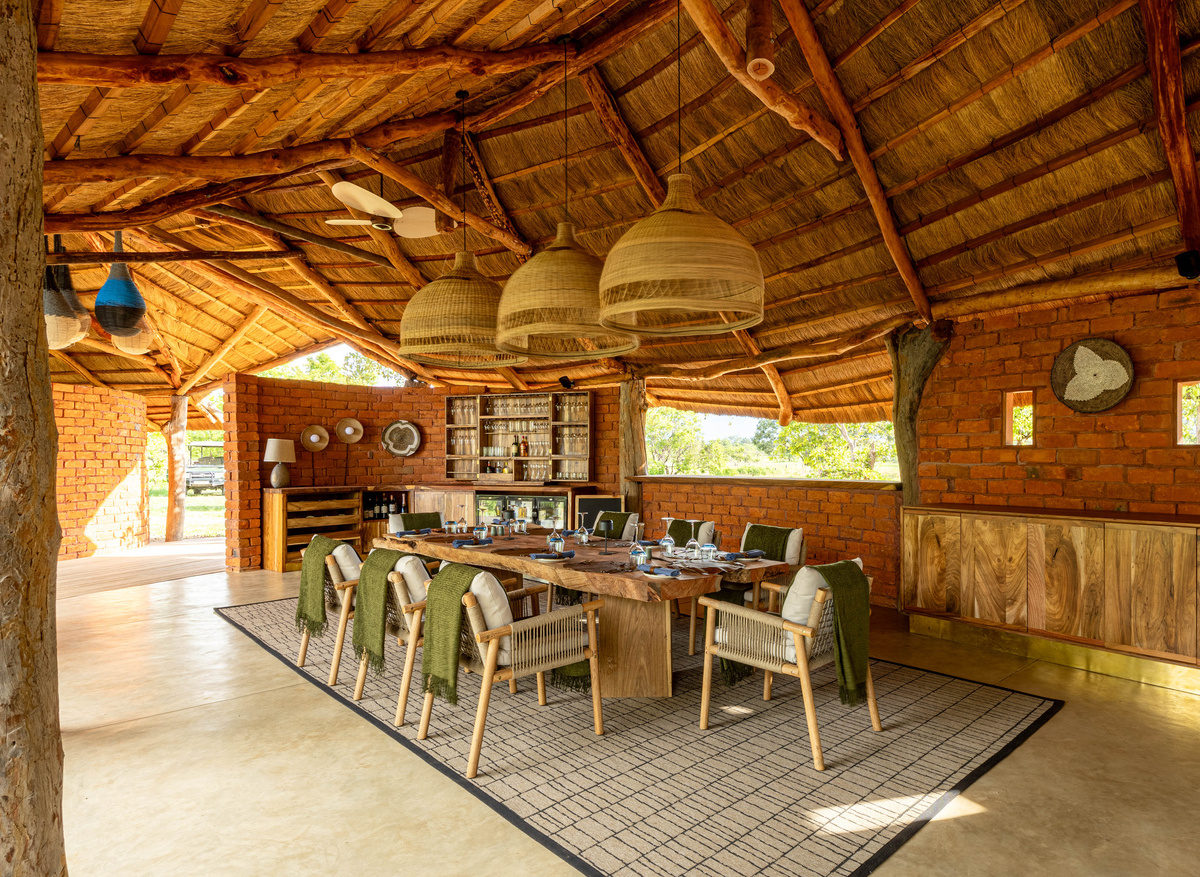 MAWIMBI Bush Camp - dining area and open bar