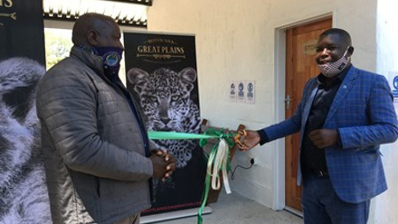 Deputy-DC-Mr-Waloka-cutting-the-ribbon-and-having-over-the-building-to-The-Great-accepting-it-on-behalf-of-the