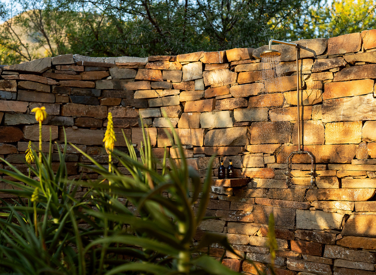 Outdoor shower in Karoo Suite at Karoo Lodge, Samara