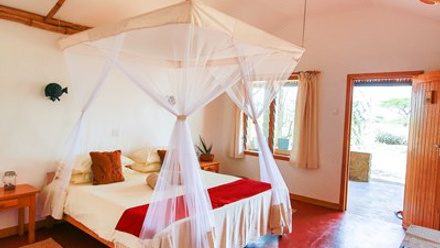 Bedroom at Ndutu Safari Lodge Cottage.jpg