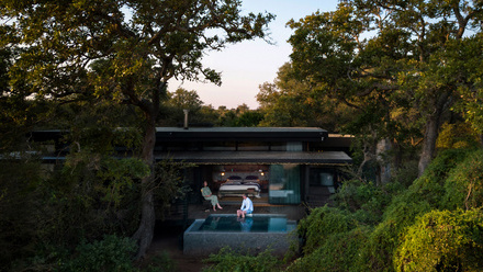 Tanda Tula Safari Camp - Suite - Relaxing at pool.jpg