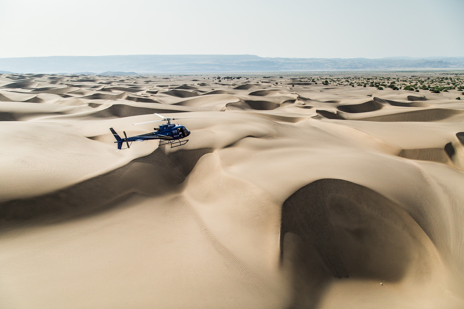 The+Safari+Collection+helicopter+landing+on+Suguta+Valley+sand+dunes.jpg