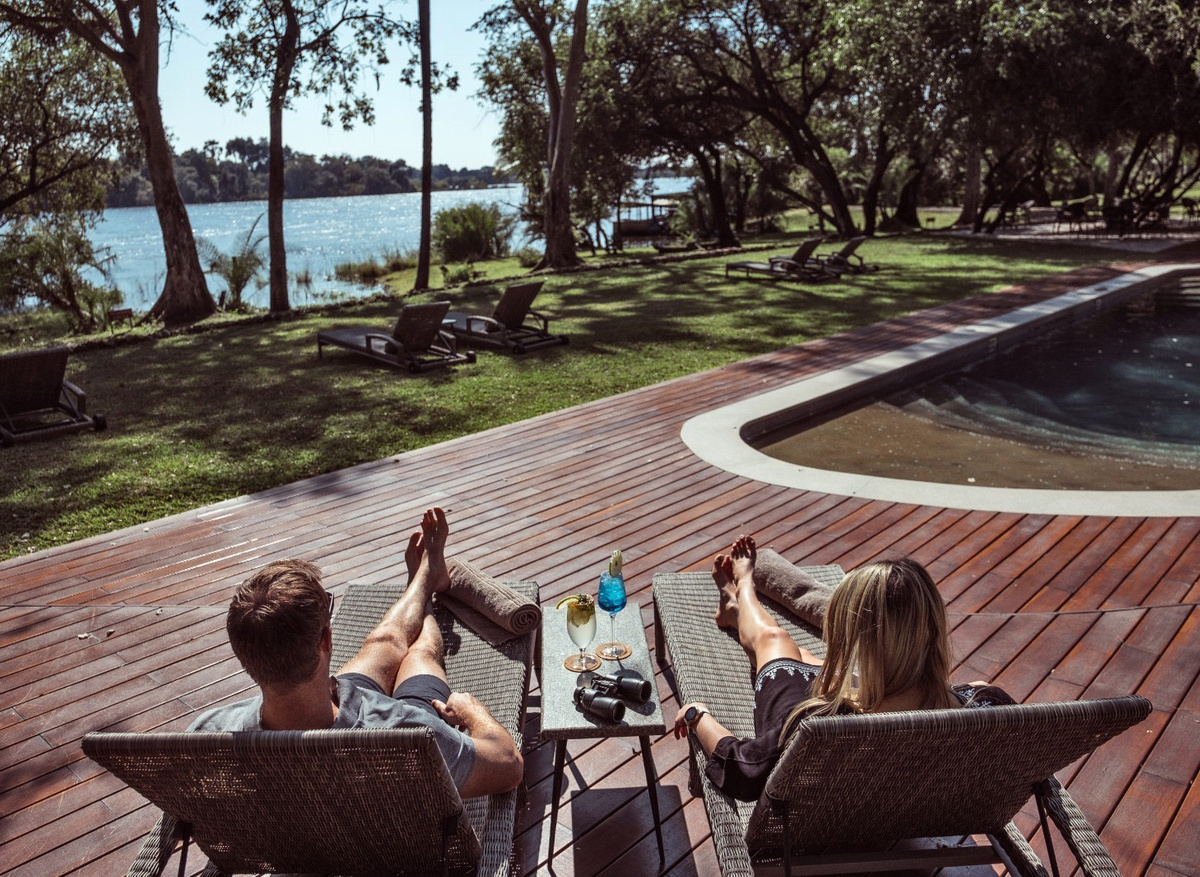 Pool view & cocktails overlooking river
