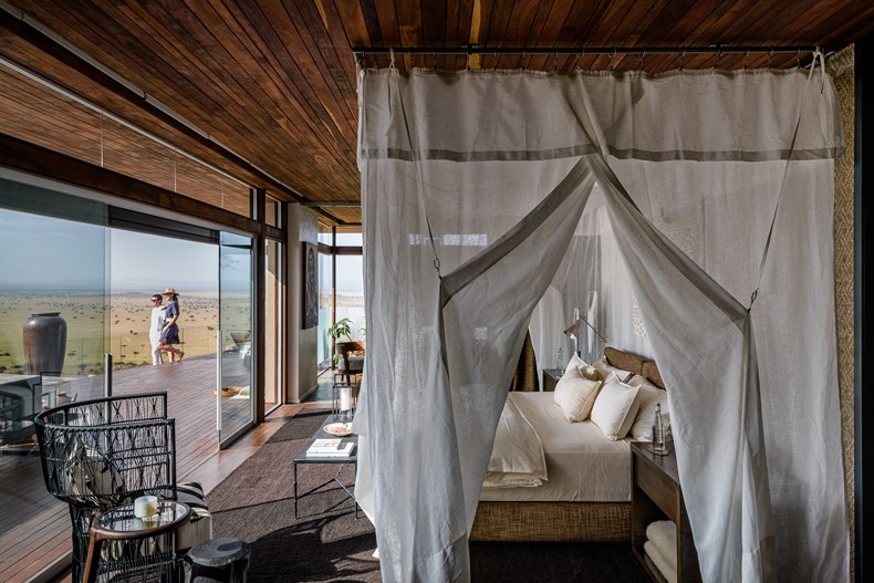 94DC-hillside-suite-singita-sasakwa-lodge-bedroom-and-deck.jpg