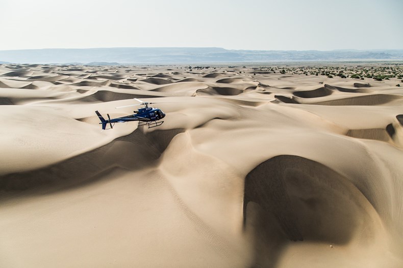 B087-the-safari-collection-helicopter-landing-on-suguta-valley-sand-dunes.jpg