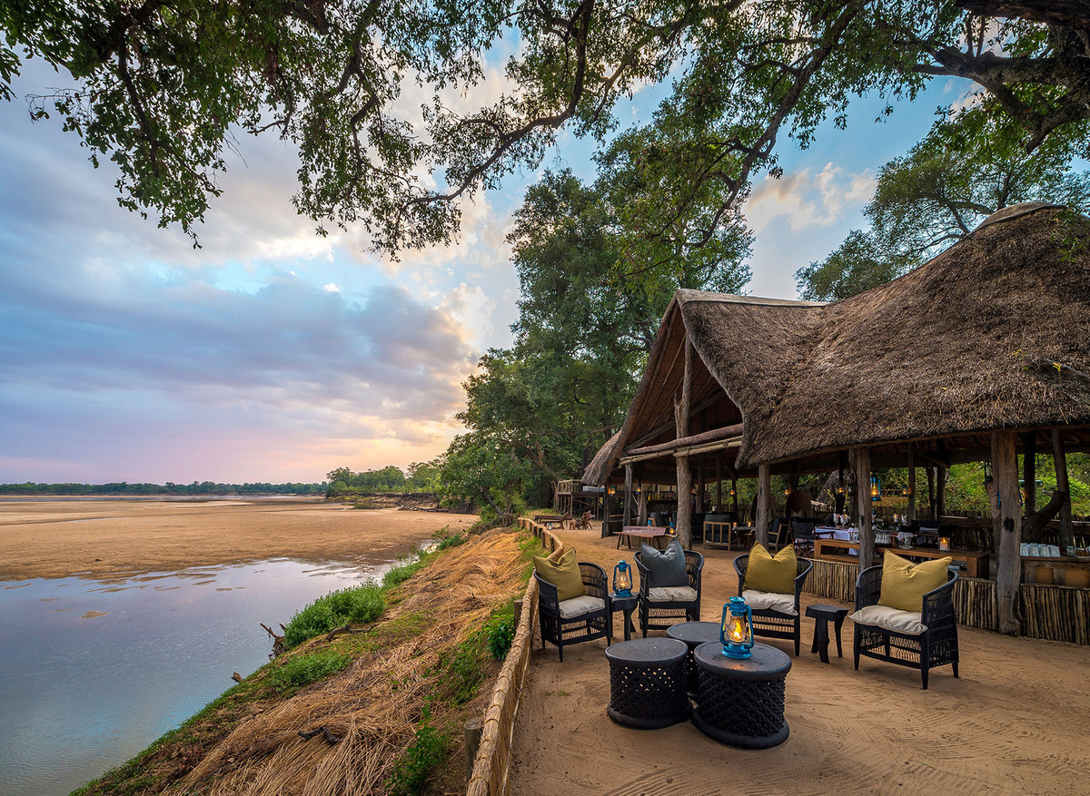 THE-BUSHCAMP-COMPANY---Chamilandu-Bushcamp----Main-area-overlooking-the-river.jpg