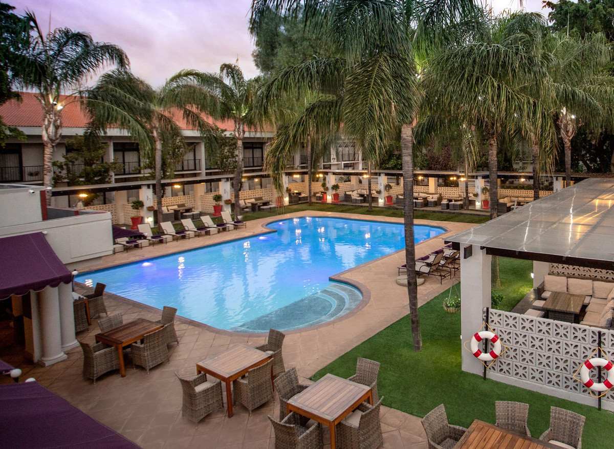 Avani Gaborone Resort & Casino_ View of the Pool at Sunrise .jpg