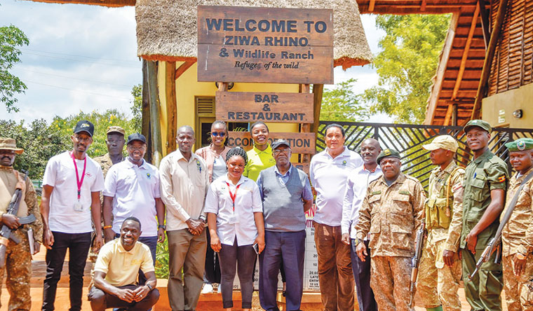 Minister-Tom-Butime-at-Rhino-sanctuary.jpg